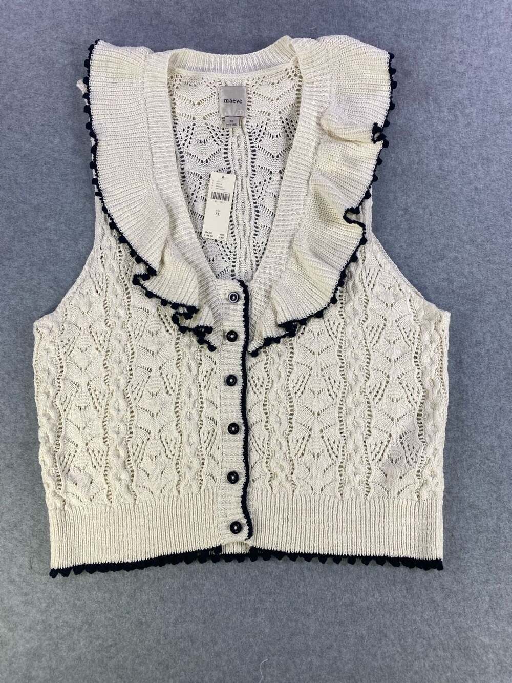 Maeve Sleeveless Knit Vest with Ruffle Collar and Black Trim